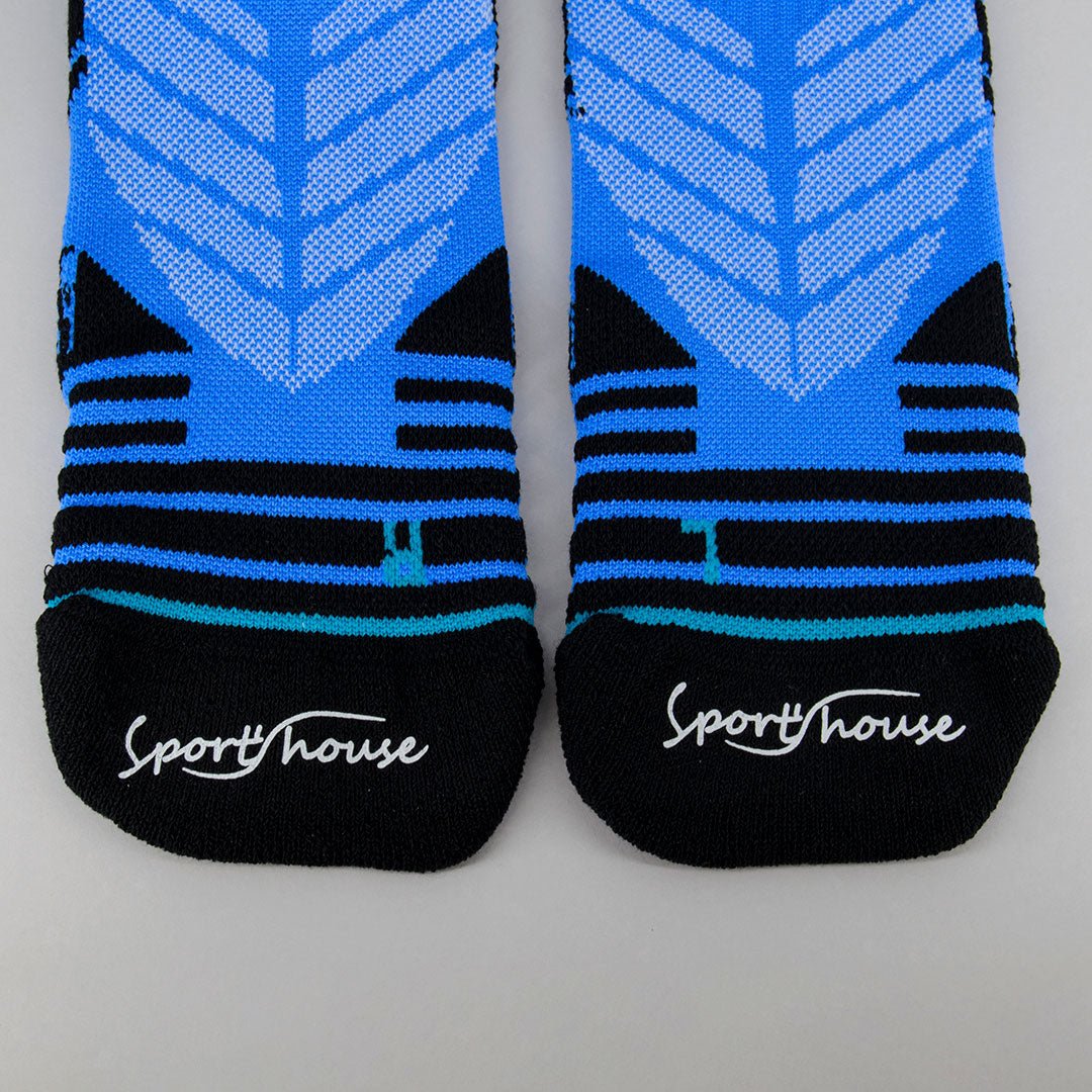 Calcetines para ciclismo azul de hombre con acolchado técnico por zonas y ajustes sin costuras.-Kylie Crazy